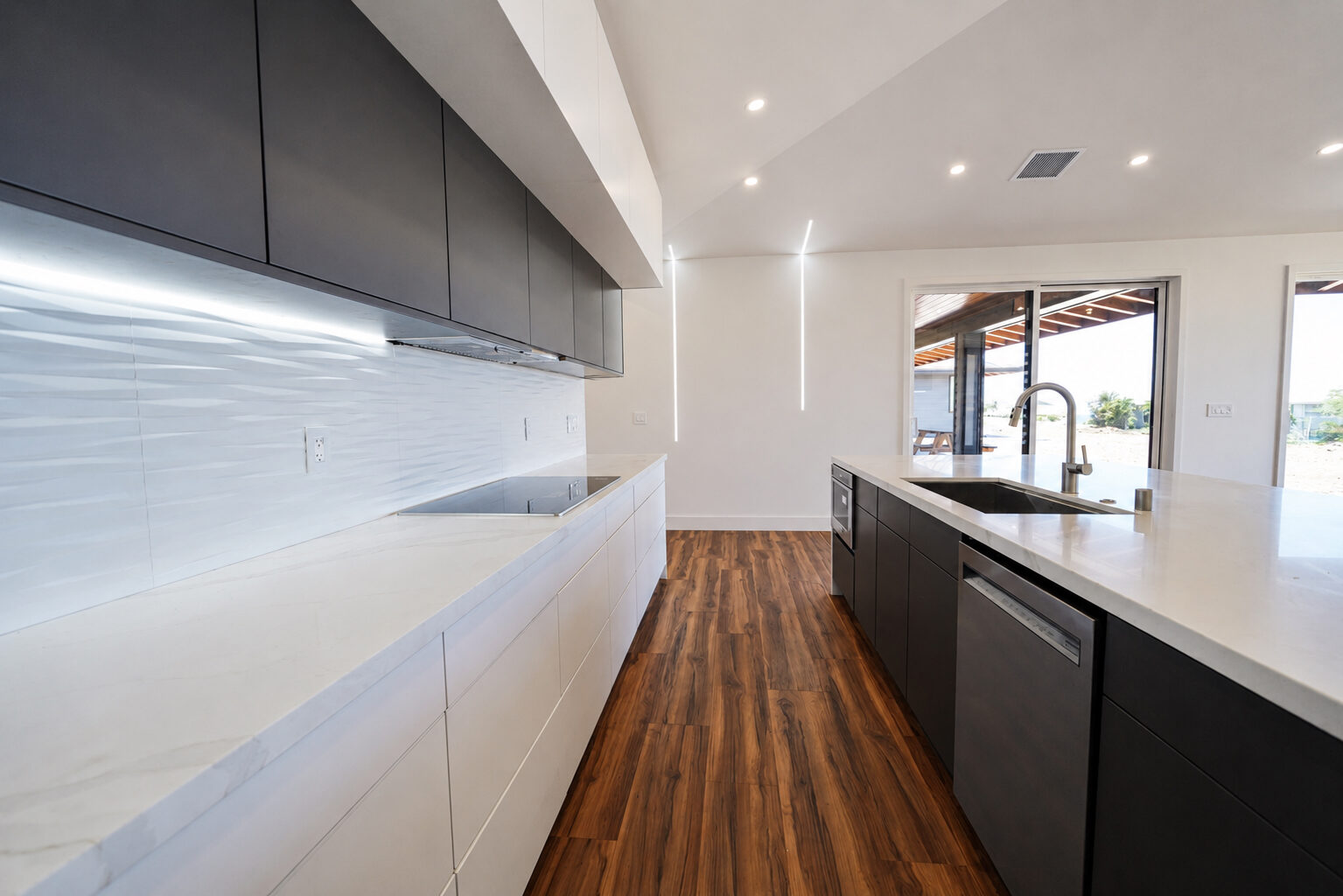 Kitchen and dining with walls of glass