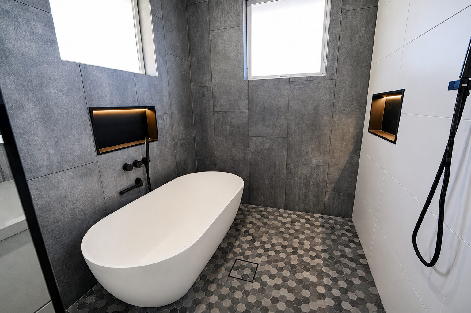 Master bath with double vanity and tile detail